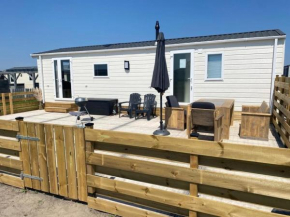 Neues Ferienhaus Chalet Nr73 direkt am Wattenmeer, komplett eingezäunt